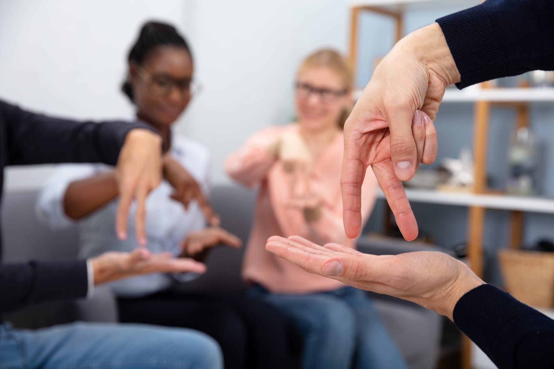 Group,Of,Multi,Ethnic,People,Communicating,With,Hand,Sign,Languages